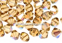 Swarovski, beads bicone xilion, light colorado topaz shimmer, 6mm - x10