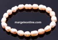 Elastic bracelet made of light peach freshwater pearls 8-10mm