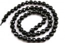 Onix, black, faceted round, 4.5mm